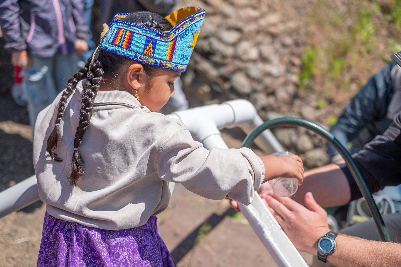 Children release salmon at the annual Return to the River Festival